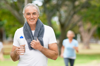 Mature Man Cooling Off After Workout