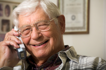 senior man talking on telephone