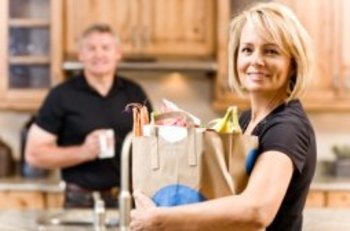 mature woman with groceries