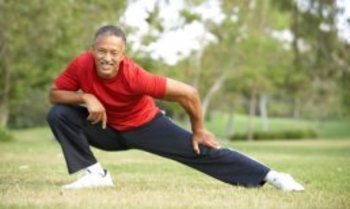 Senior Man Exercising In Park