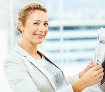 Confident woman at work - cropped