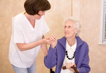 Senior at home with caregiver