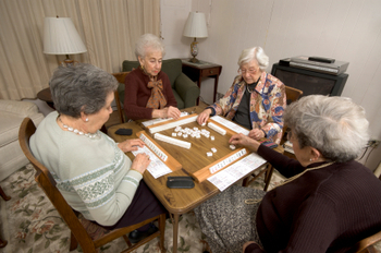 senior woman at the game table