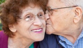 Senior Man Kissing Senior Woman