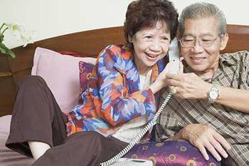senior-couple-on-phone